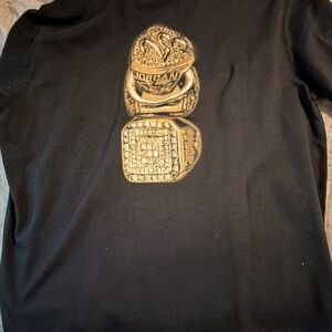 Jordan Black Tee with Gold Ring Stack Graphic
